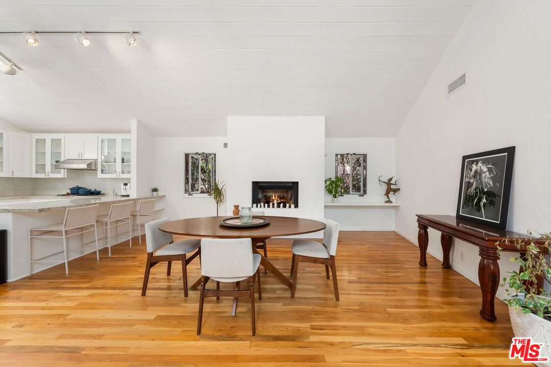 22760 Chamera Lane Topanga, CA 90290 - Photo 17 of 52 a view of a dining room with furniture