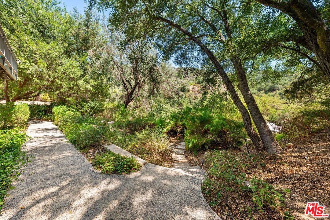 22760 Chamera Lane Topanga, CA 90290 - Photo 7 of 52 a pathway of a yard