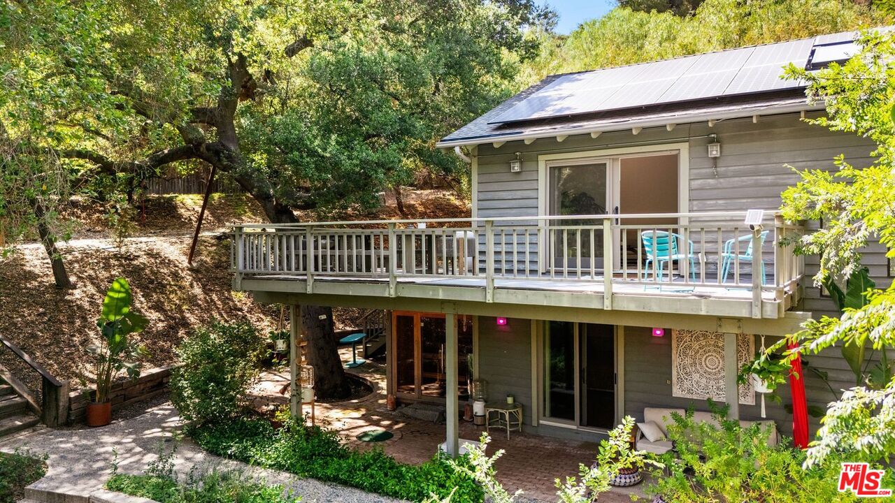 22760 Chamera Lane Topanga, CA 90290 - Photo 9 of 52 a house view with a garden space