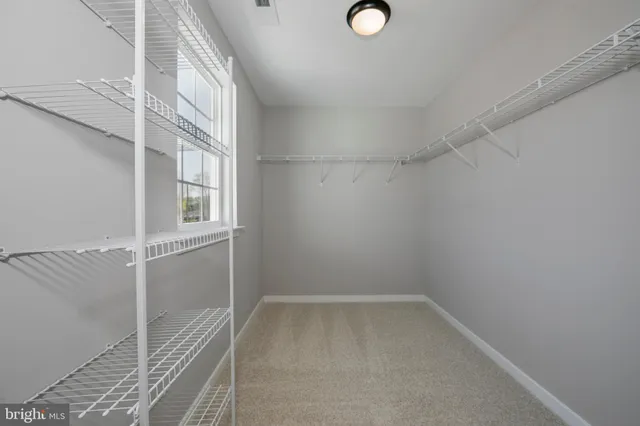 a view of a room with rack on the wall