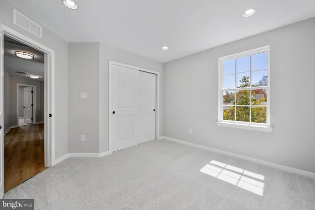 a view of livingroom with hardwood floor and a window