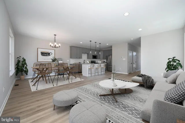 a living room with furniture and a table