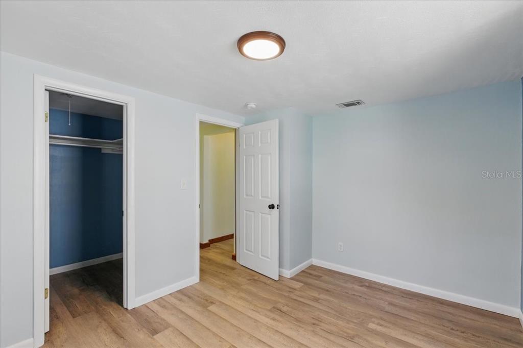 12301 Cedar Street Cedar Key, FL 32625 - Photo 23 of 38 a view of empty room with wooden floor