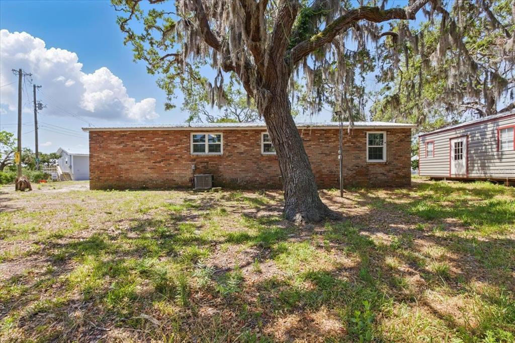 12301 Cedar Street Cedar Key, FL 32625 - Photo 29 of 38 a view of a backyard of the house