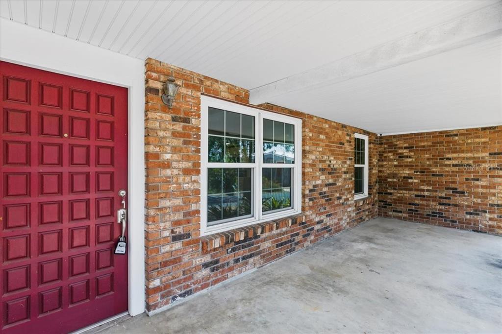 12301 Cedar Street Cedar Key, FL 32625 - Photo 5 of 38 a view of front door of house