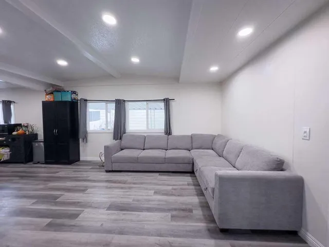 a living room with furniture and a couch