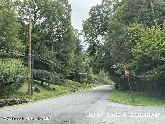 a view of a wooden fence