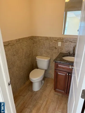 a bathroom with a toilet and a sink