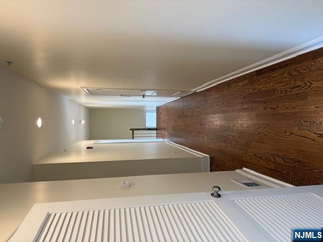 600 Frank E Rodgers Boulevard North, Unit 3 Harrison, NJ 07029 - Photo 13 of 16 a view of hallway with wooden floor