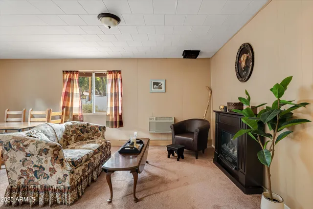 a kitchen with a stove a sink and a refrigerator
