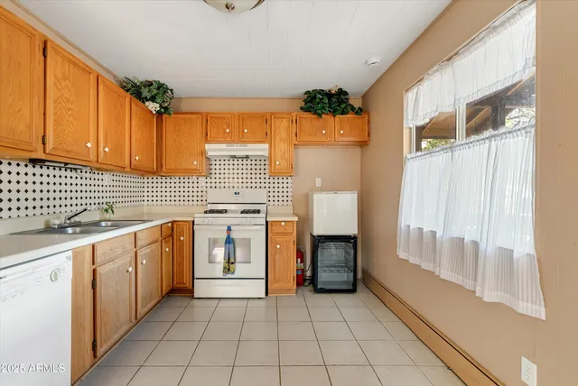 a view of balcony with wooden floor