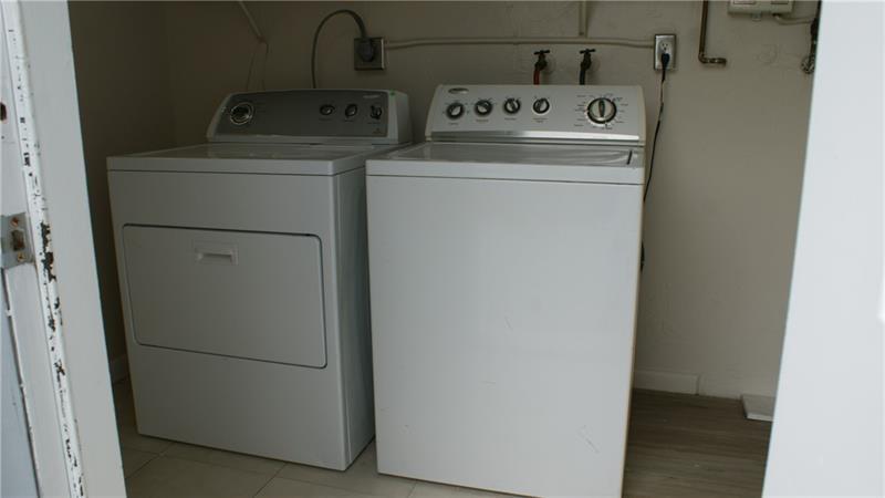 6109 Southwest 30th Street, Unit 1 Miramar, FL 33023 - Photo 11 of 11 a utility room with dryer and washer