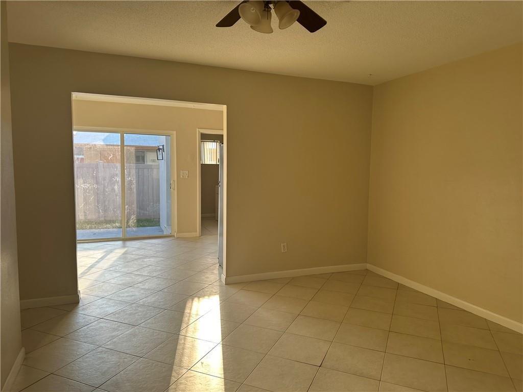 6109 Southwest 30th Street, Unit 1 Miramar, FL 33023 - Photo 5 of 11 a view of an empty room and window