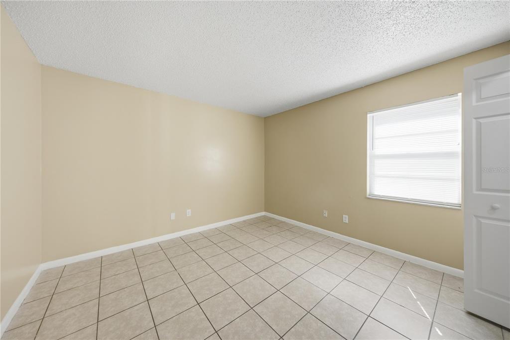 1836 Southwest 109th Place Ocala, FL 34476 - Photo 14 of 16 a view of an empty room and window