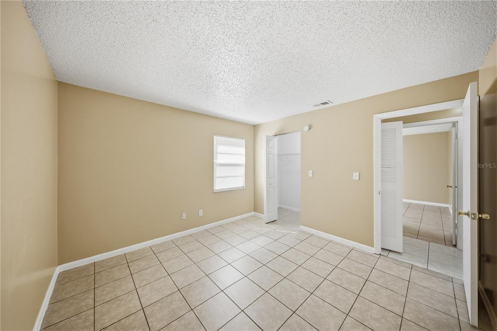 1836 Southwest 109th Place Ocala, FL 34476 - Photo 15 of 16 a view of an empty room and window
