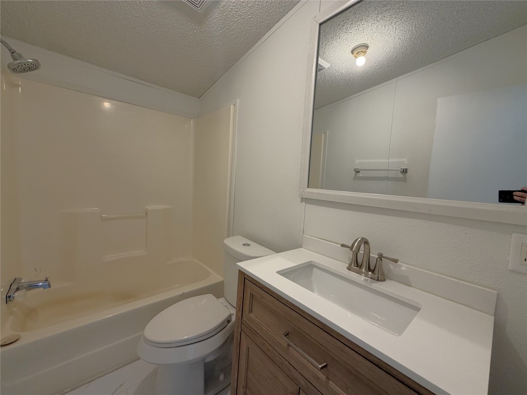 161 Farm To Market 1617 Trinity, TX 75862 - Photo 13 of 15 a bathroom with a sink toilet and shower
