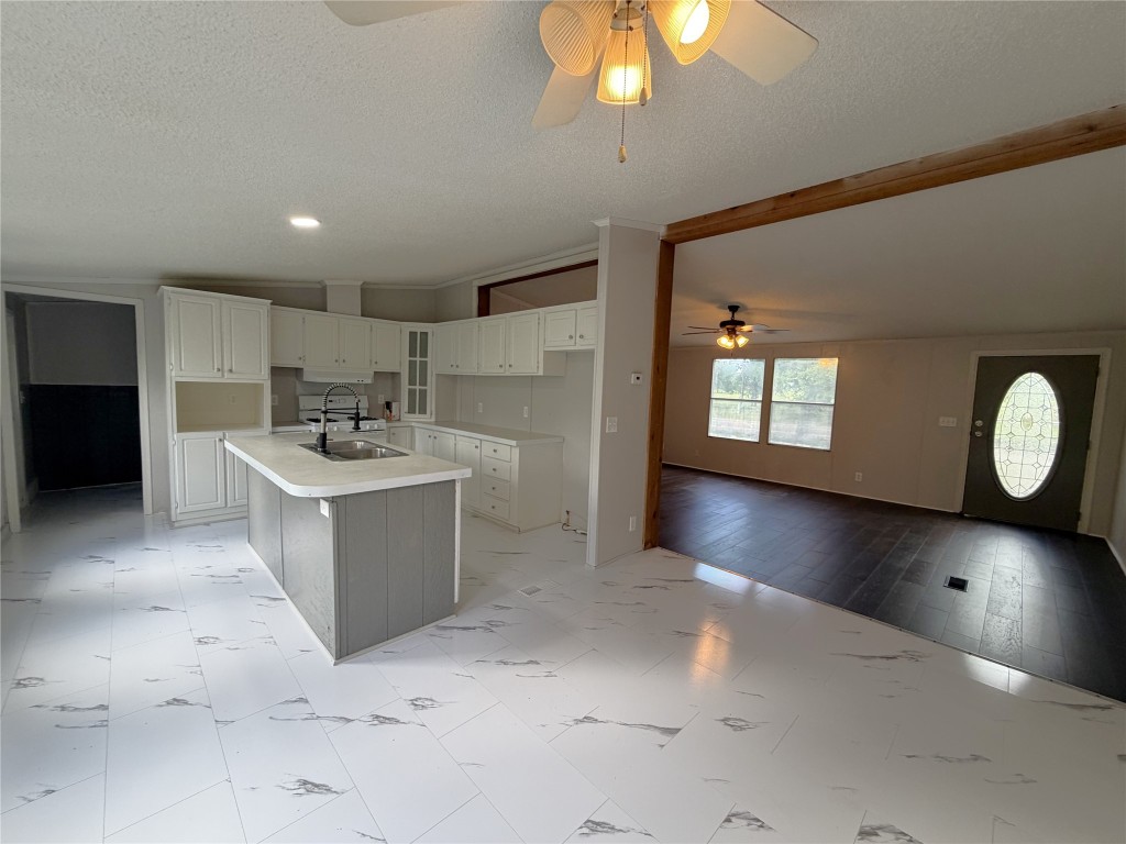 161 Farm To Market 1617 Trinity, TX 75862 - Photo 6 of 15 a view of a kitchen with a sink and a stove