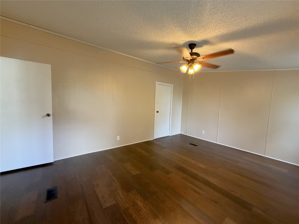 161 Farm To Market 1617 Trinity, TX 75862 - Photo 9 of 15 an empty room with a fan and a ceiling fan