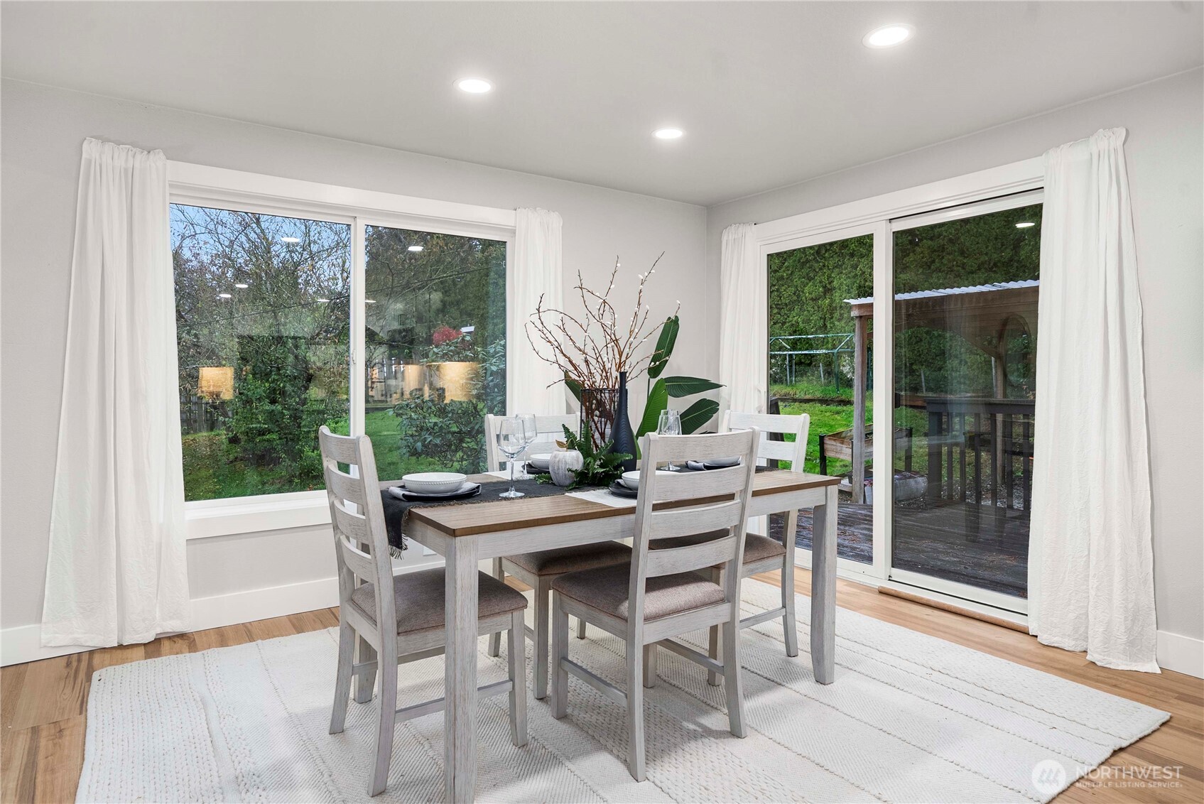 30150 10th Avenue Southwest Federal Way, WA 98023 - Photo 12 of 40 a view of a dining room with furniture window and outside view
