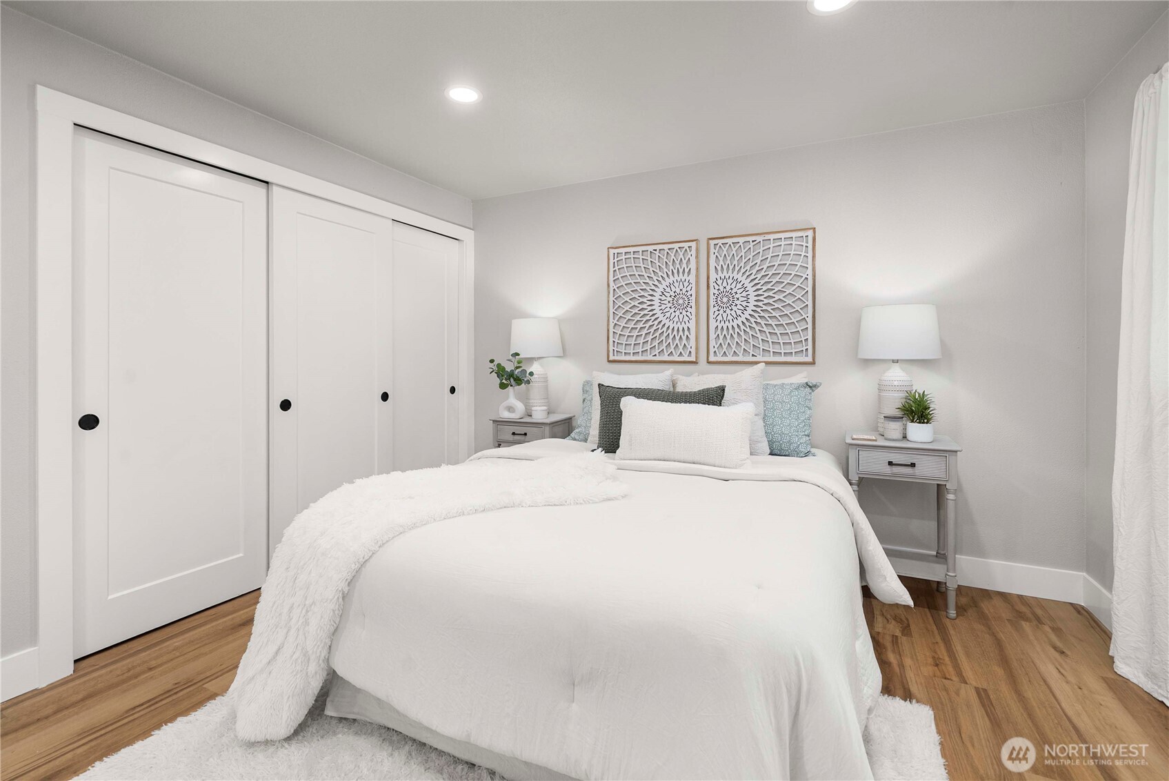 30150 10th Avenue Southwest Federal Way, WA 98023 - Photo 15 of 40 a bedroom with a bed and a night stand