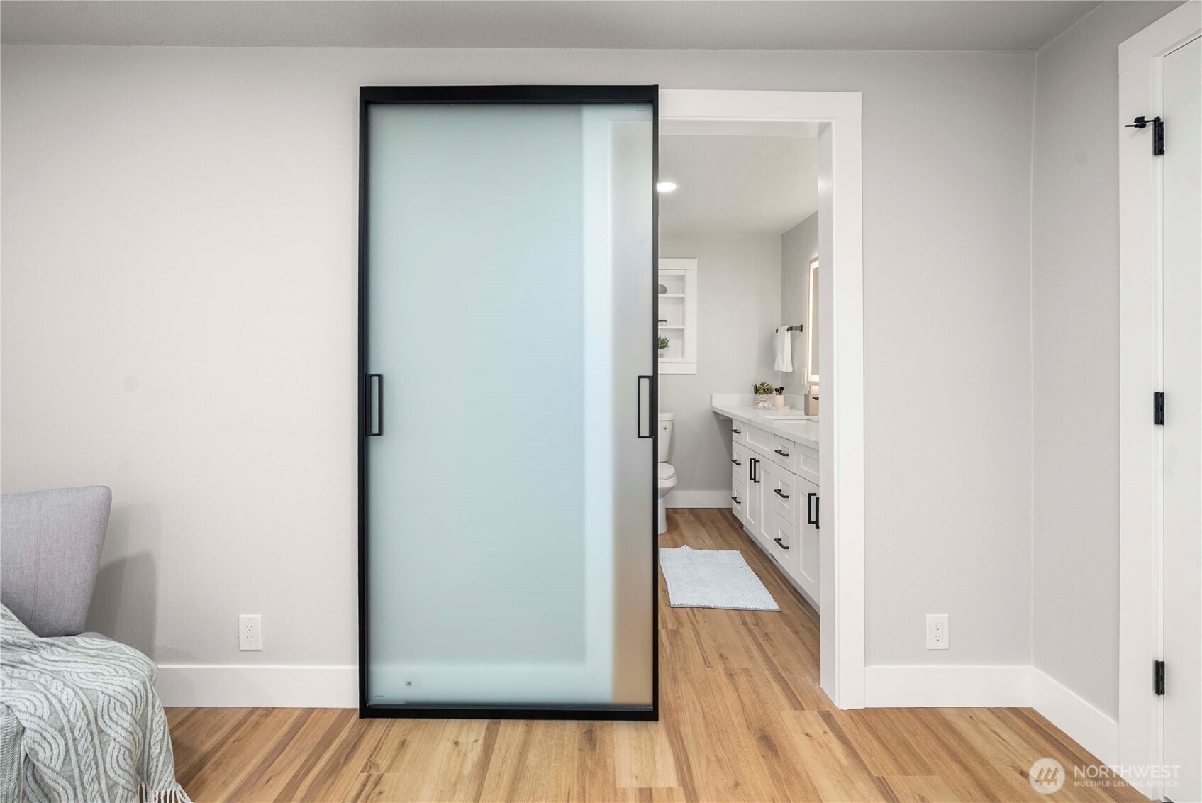30150 10th Avenue Southwest Federal Way, WA 98023 - Photo 16 of 40 a view of a bedroom with wooden floor and bedroom