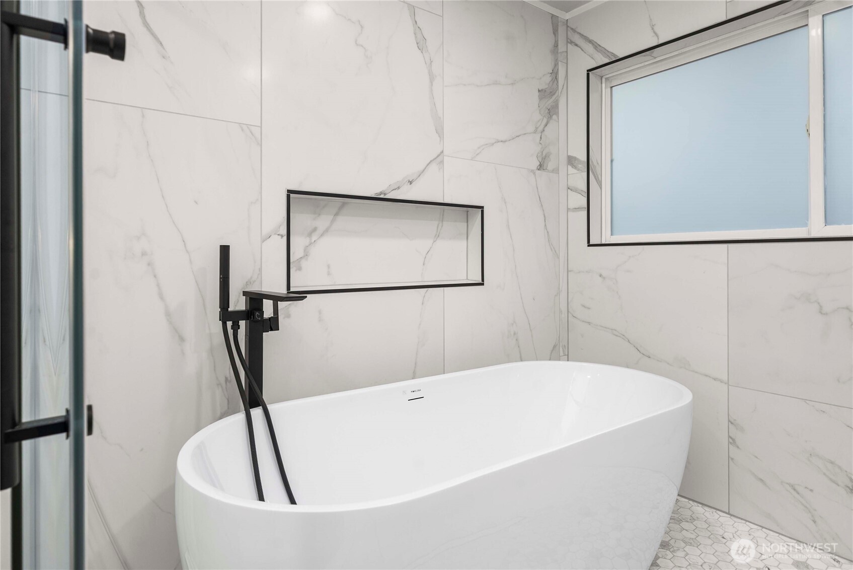 30150 10th Avenue Southwest Federal Way, WA 98023 - Photo 21 of 40 a white bath tub sitting next to a white wall