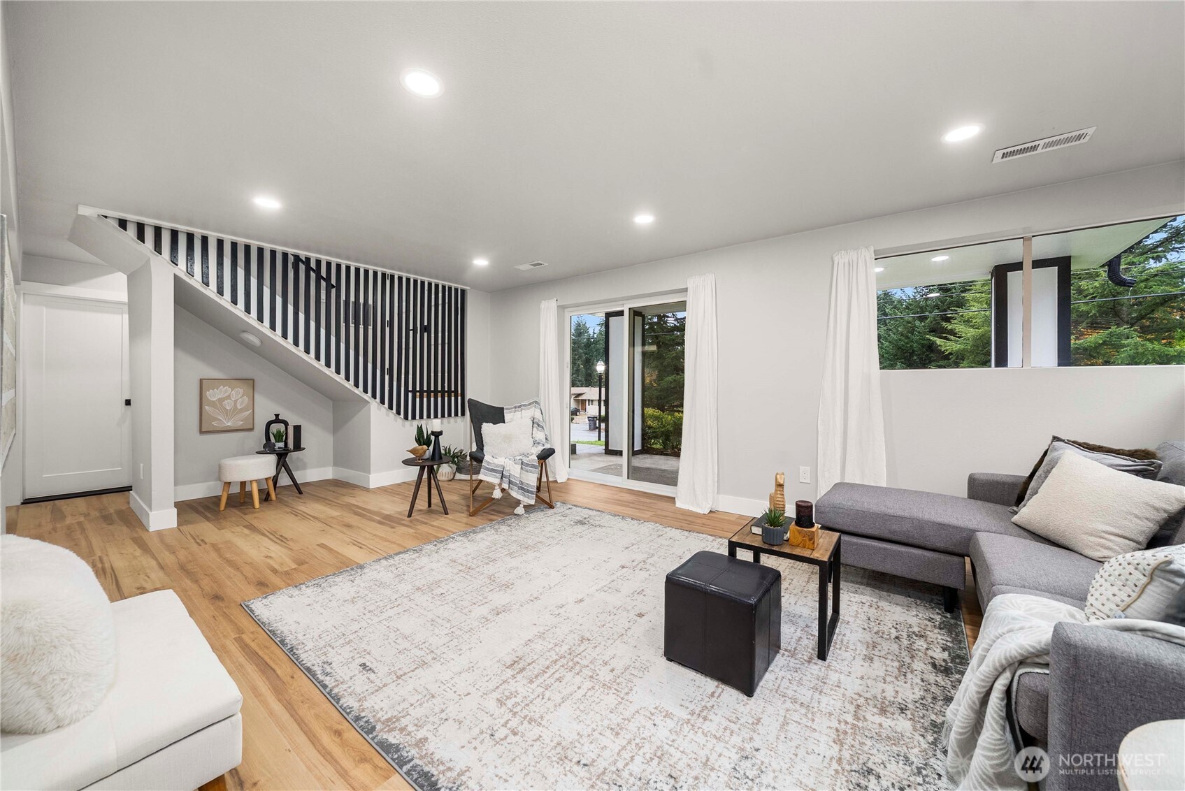 30150 10th Avenue Southwest Federal Way, WA 98023 - Photo 23 of 40 a living room with furniture and a table