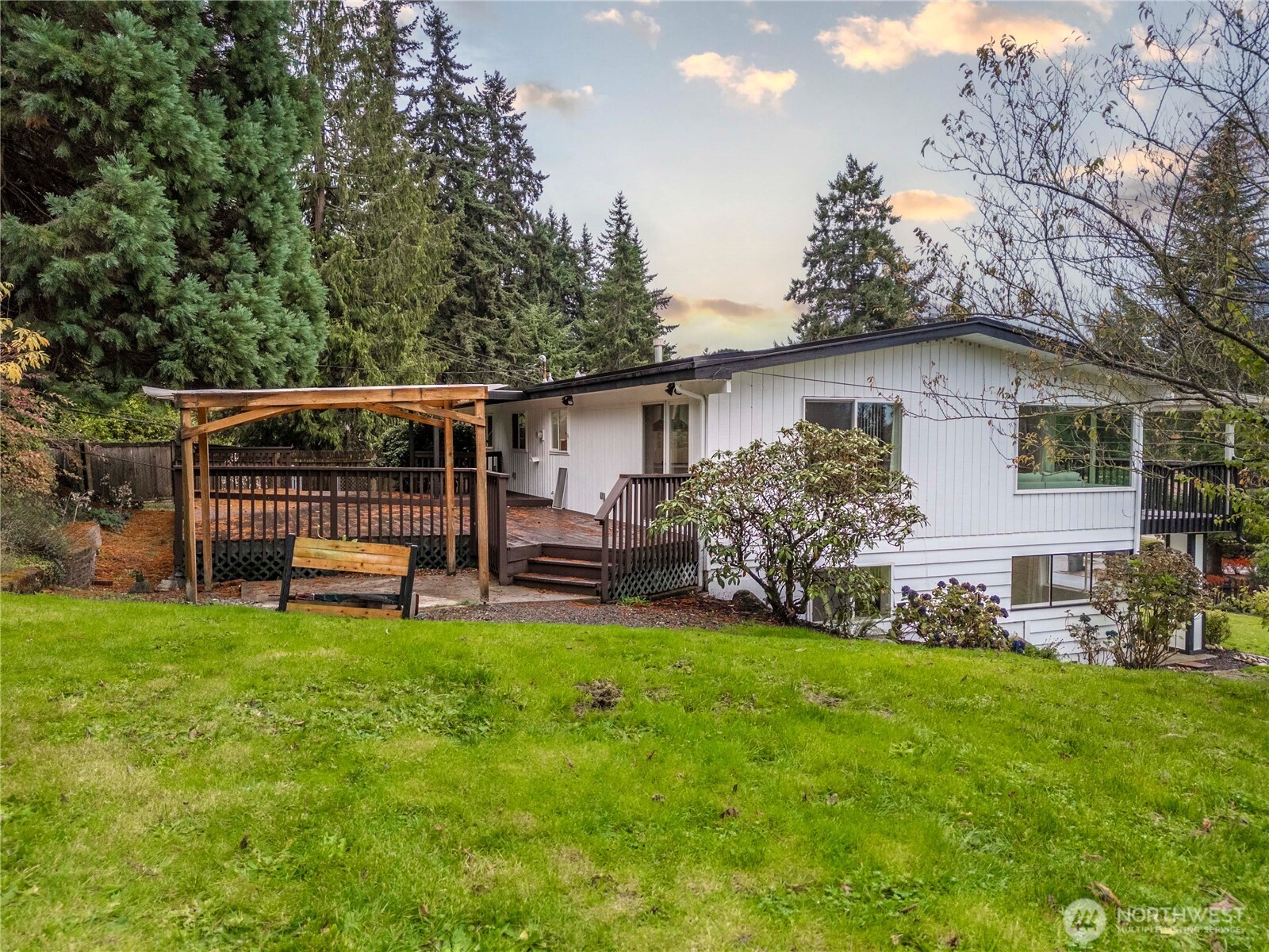30150 10th Avenue Southwest Federal Way, WA 98023 - Photo 34 of 40 a view of a house with a yard and sitting area