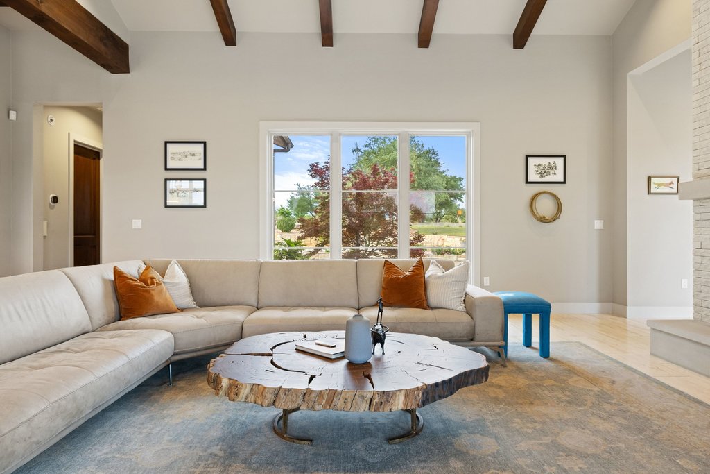 2560 Bell Springs Road Dripping Springs, TX 78620 - Photo 19 of 40 a living room with furniture and a large window