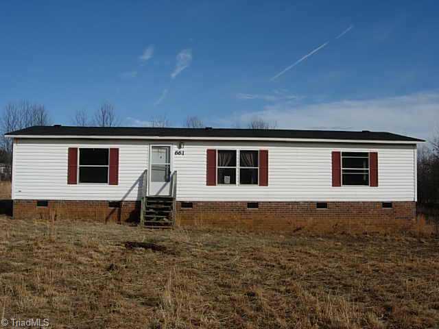661 Price Mill Road Summerfield, NC 27358 - Photo 1 of 8 Exterior Front.