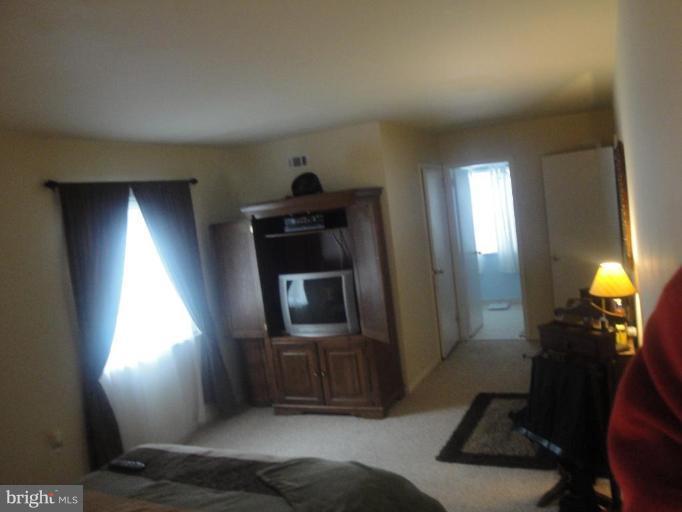 1525 Northgate Square, Unit 25/2C Reston, VA 20190 - Photo 2 of 4 Master Bedroom