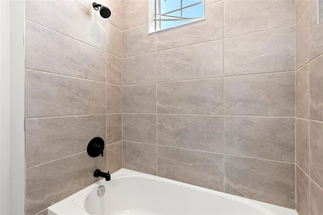 a bathroom with a bathtub