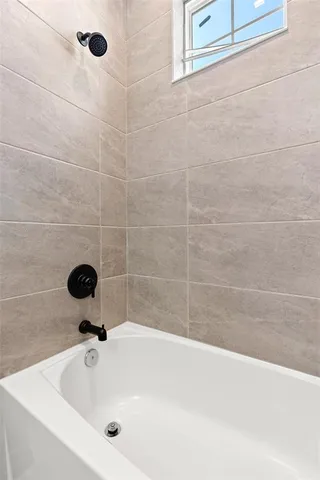 a bathroom with a tub