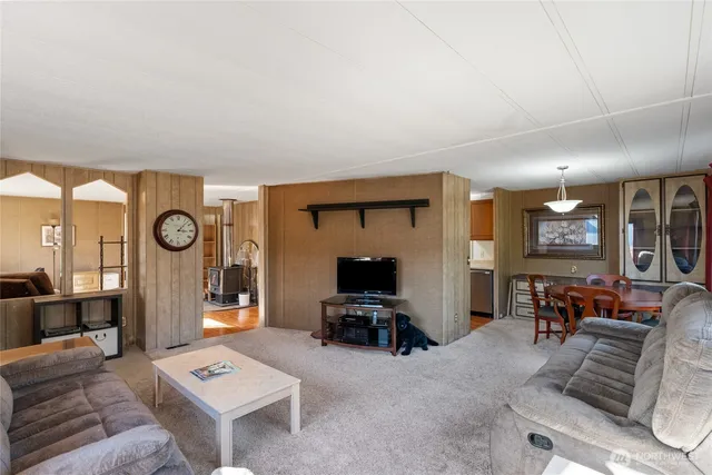 a living room with furniture and window