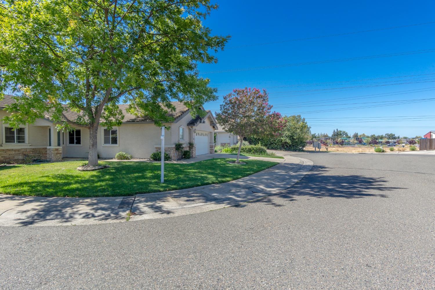 a view of a house with a street