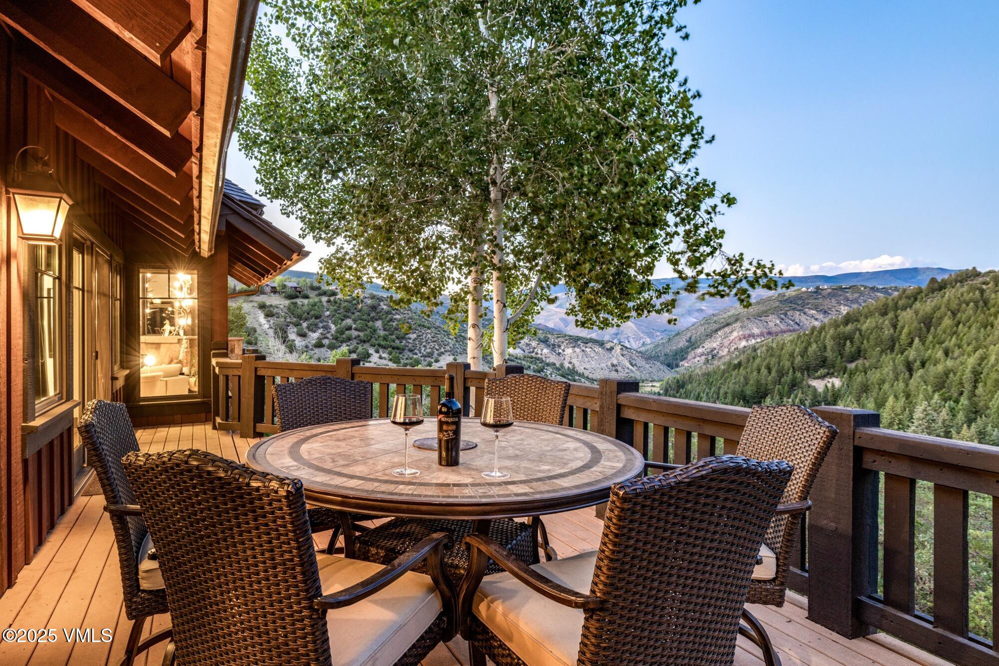 1122 Red Draw Edwards, CO 81632 - Photo 16 of 54 a view of a patio with a table and chairs and couches