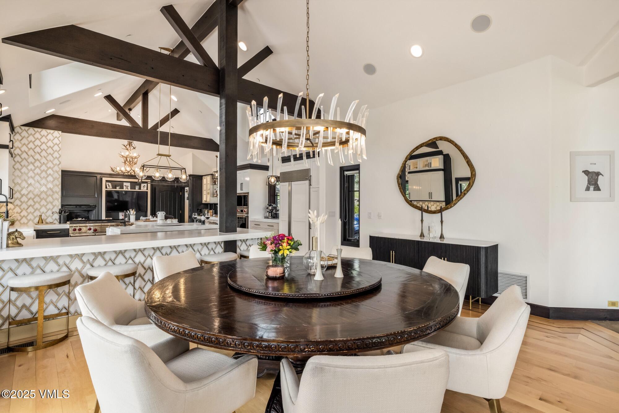 1122 Red Draw Edwards, CO 81632 - Photo 18 of 54 a view of a dining room with furniture and a chandelier