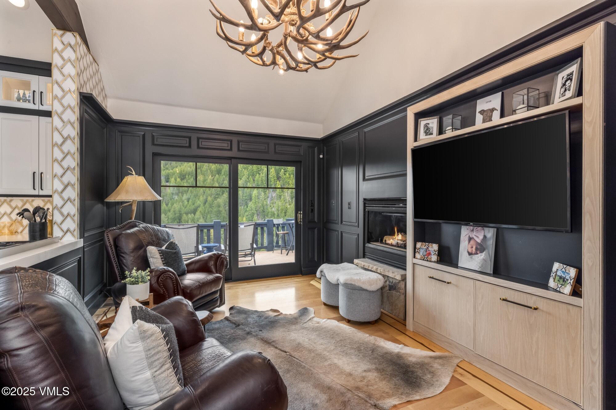 1122 Red Draw Edwards, CO 81632 - Photo 23 of 54 a living room with furniture and a flat screen tv
