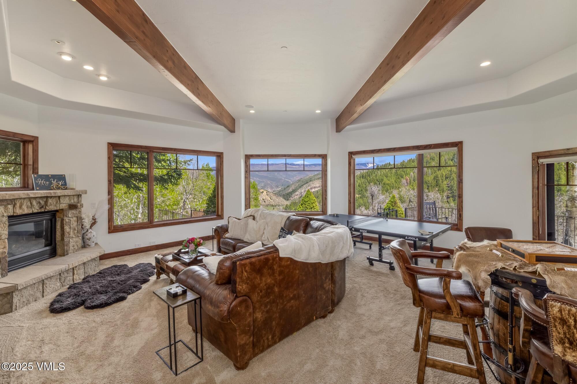 1122 Red Draw Edwards, CO 81632 - Photo 25 of 54 a living room with furniture and a fireplace