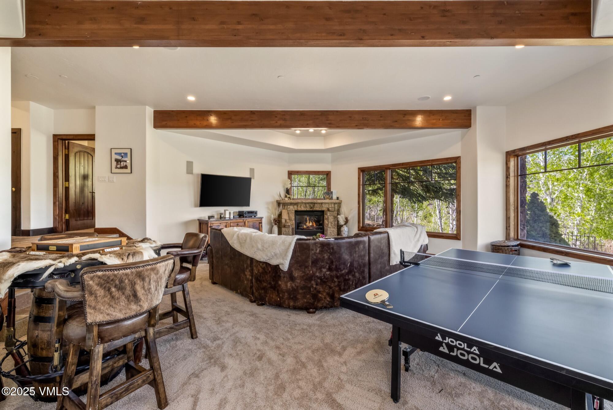 1122 Red Draw Edwards, CO 81632 - Photo 30 of 54 a living room with furniture and a flat screen tv