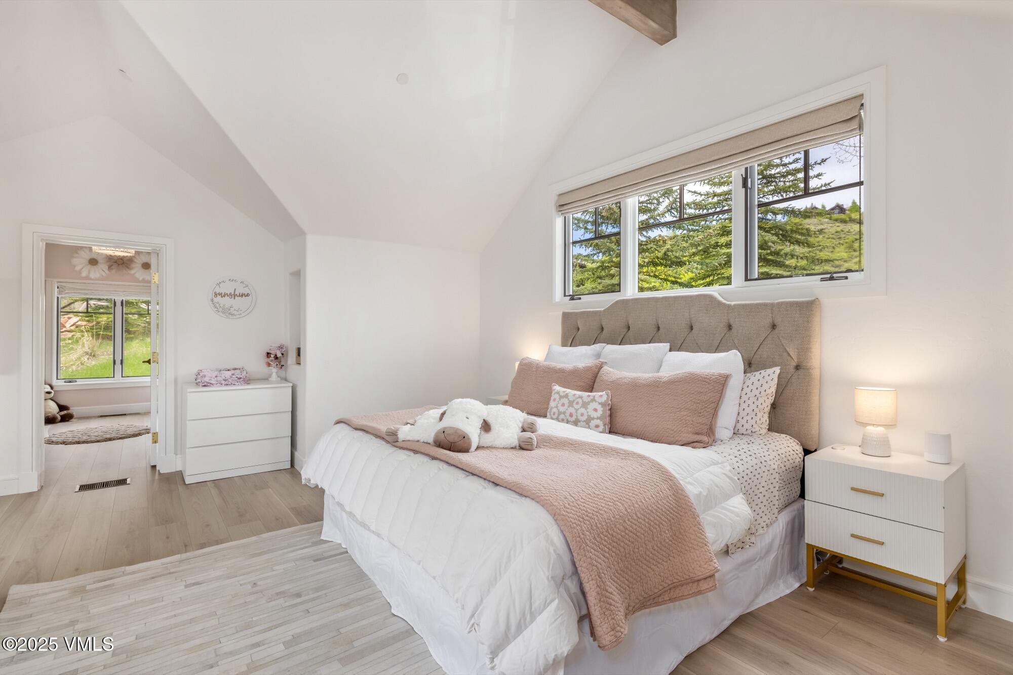 1122 Red Draw Edwards, CO 81632 - Photo 37 of 54 a bedroom with a bed and a window