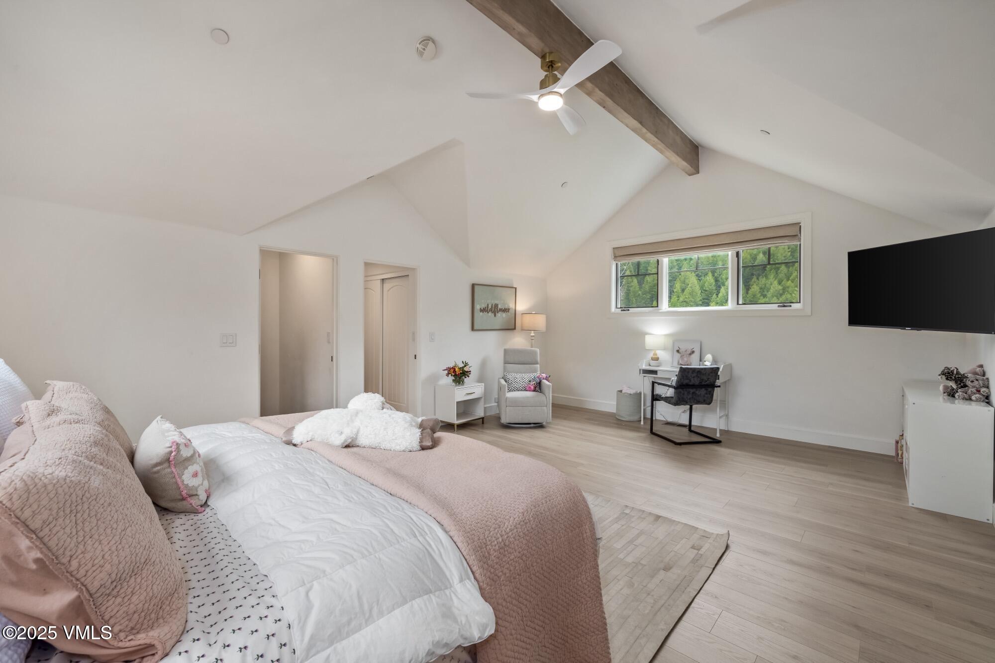 1122 Red Draw Edwards, CO 81632 - Photo 39 of 54 a bedroom with bed tv and window