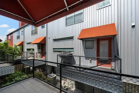 a view of house with a patio