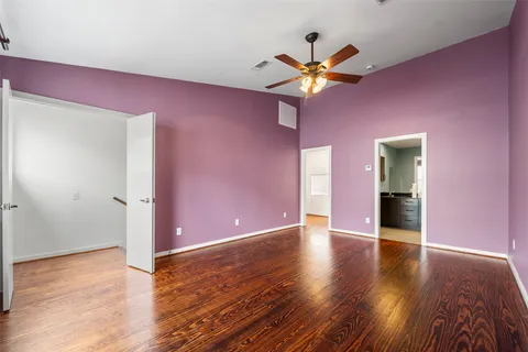 a bathroom with a double vanity sink toilet and shower