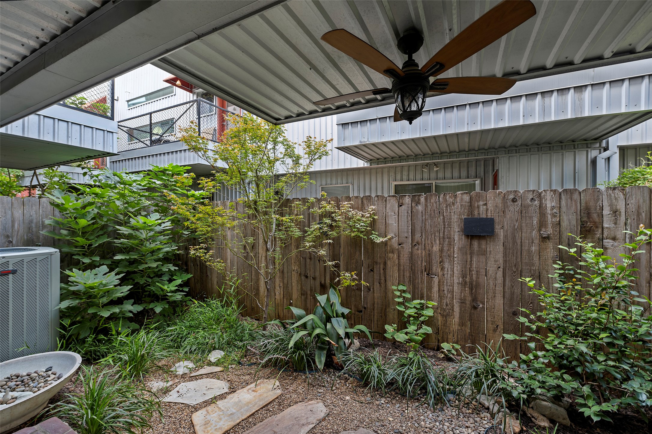 3018 Commerce Street Houston, TX 77003 - Photo 26 of 34 a view of a porch with potted plants