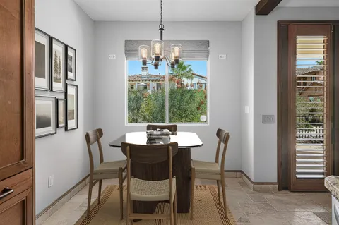 a view of a livingroom with furniture window and outside view