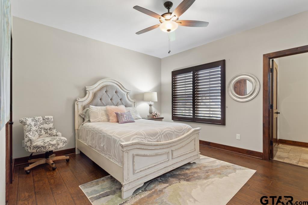 2907 Stewart Way Tyler, TX 75709 - Photo 26 of 45 a bedroom with a bed and a window