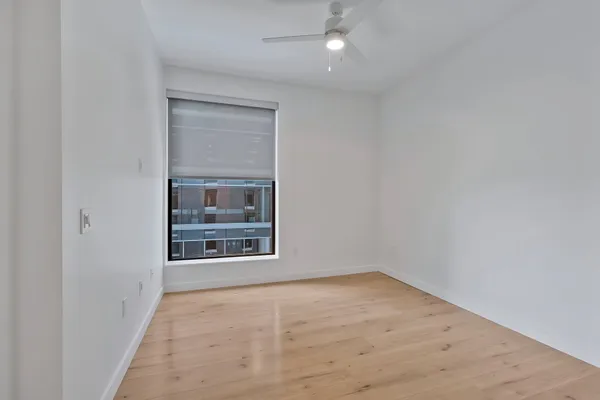 a large kitchen with stainless steel appliances granite countertop a stove and a sink