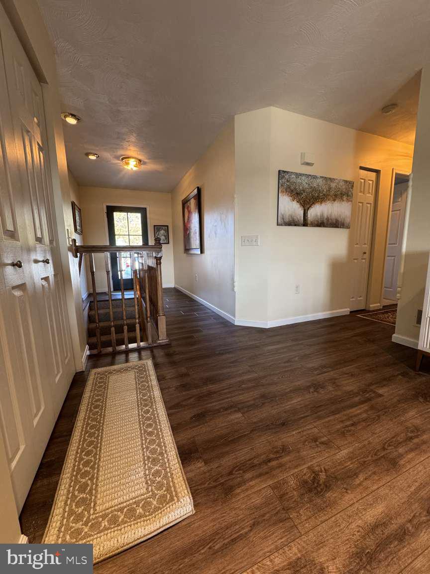 244 Anchor Road Elizabethtown, PA 17022 - Photo 6 of 42 a view of a livingroom with wooden floor and furniture
