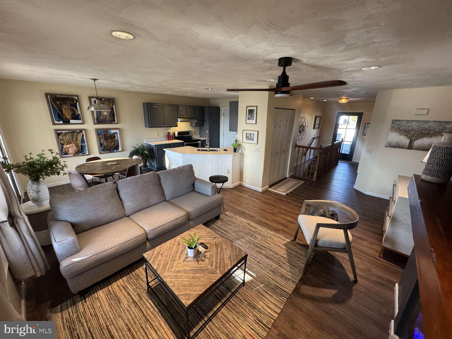 244 Anchor Road Elizabethtown, PA 17022 - Photo 8 of 42 a living room with furniture and a wooden floor